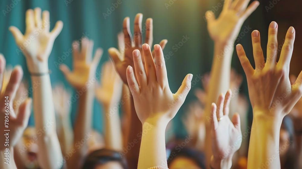 Poster energetic crowd of eager students raise hands in academic lecture hall,capturing enthusiasm for lear
