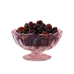 Pink glass bowl with raisins on transparent background, tableware art display