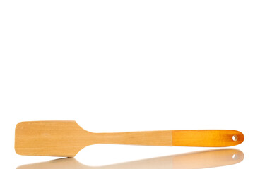 One wooden spatula, macro, isolated on white background.