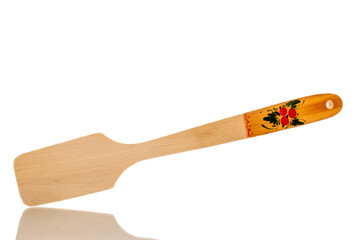 One wooden spatula, macro, isolated on white background.