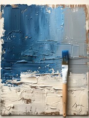 Abstract textured painting in blue and white with a paintbrush. Artistic background concept.