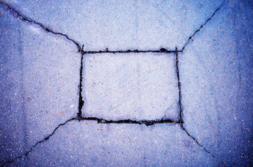 Rectangular crack in street asphalt texture background - 780679887