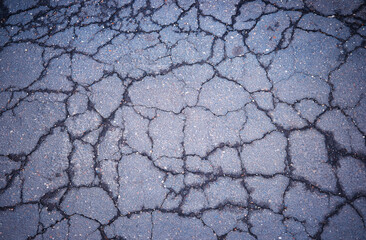 Cracked asphalt texture background - 780680271