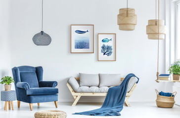 Photo of A blue armchair and sofa in front of white wall with poster frames on it, minimalistic interior design