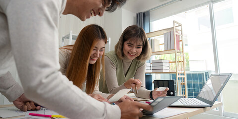 Brainstorm team of creative web graphic designer planning. Creative designers present ux ui to team. Designers team working meeting in office