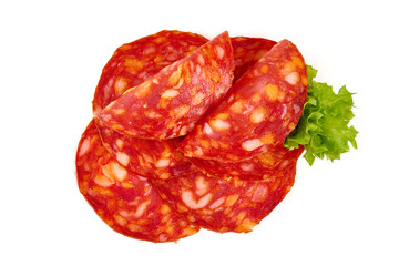 Spanish pork chorizo sausage slices, close-up, isolated on white background