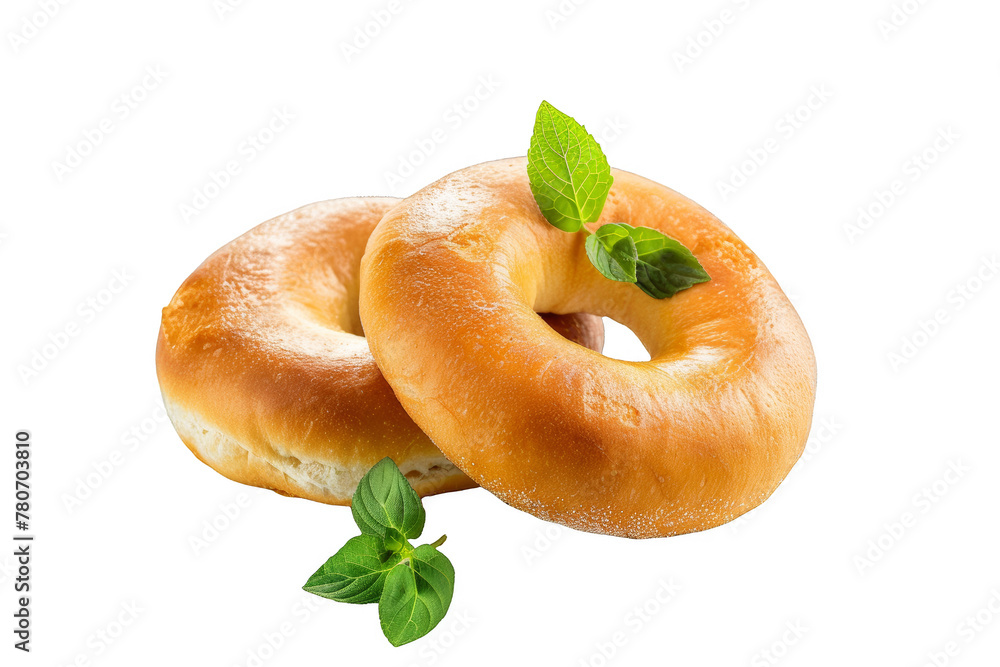 Wall mural Two Bagels Topped With Green Leaves