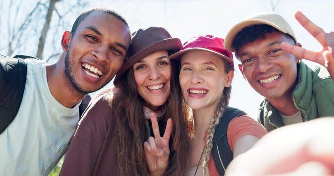 Happy friends, vlogging and hiking with selfie in nature for fun travel, journey or outdoor memory together. Portrait of excited group with peace sign or smile for live streaming or trekking in woods