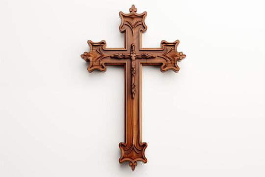 Christian religious wooden cross on white background. Christian religious crucifix on white background. Topics related to the Christian religion. Topics related to death. Object of worship and belief,