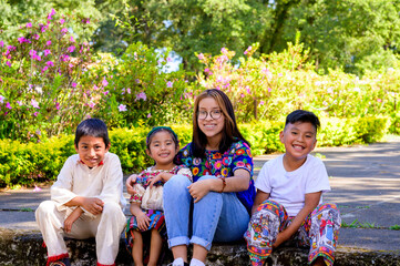 Group of cousins and brothers of the Mayan ethnic group take a portrait photo.