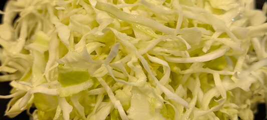 Cabbage cut into strips for cooking.