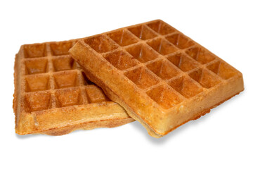 Two Belgian waffles isolated on a white background.