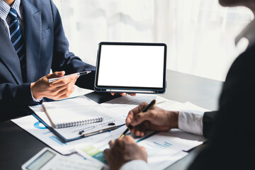 Strategic analysis and business planning Businessman holding financial documents on tablet with screen copy space.