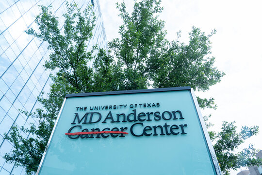 Houston, Texas, USA - April 7, 2024: University of Texas MD Anderson Cancer Center logo sign at Texas Medical Center in Houston, Texas, the largest cancer center in the U.S.