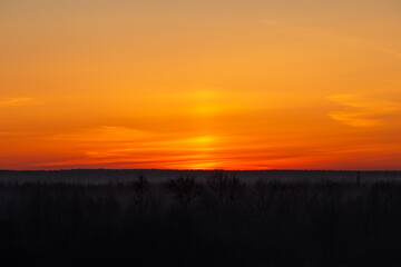 Fototapeta na wymiar Orange dawn, early morning over the river
