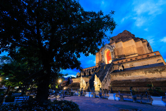 Wat chedi Luang historic temple illuminated at dusk