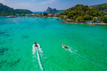 Aerial top view longtail boat to Island Phi Phi, turquoise clear water in Krabi Thailand. Amazing...