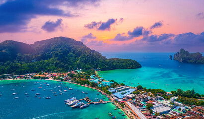 Amazing travel photo Thailand tropical paradise by drone. Aerial view sunset Phi Phi island, Krabi...