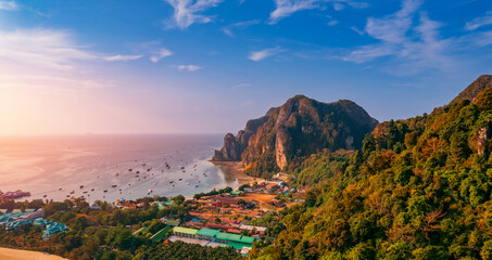 Amazing travel photo Thailand tropical paradise by drone. Aerial view sunset Phi Phi island, Krabi Province