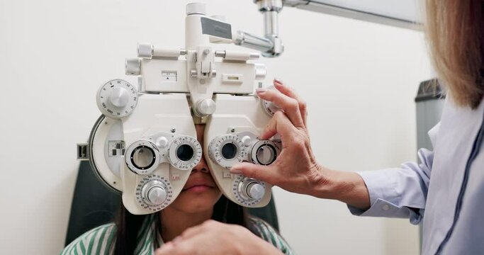 Eye care, machine and child in clinic, test and specialist, phoropter or refractor for girl. Healthcare, technology and medical help for kid, exam and hospital for glasses or optical prescription