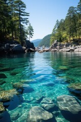 A body of water encircled by trees and rocky formations