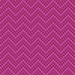 Pink knitted seamless tileable pattern. Knitted fabric texture. Realistic knit texture for wallpaper, background, wrapping paper.