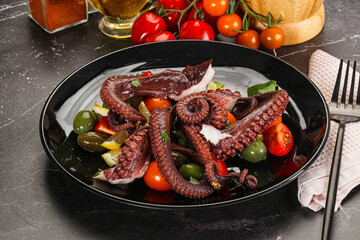 Salad with octopus tentacle and vegetables