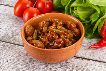 Meatball with vegetables and spices