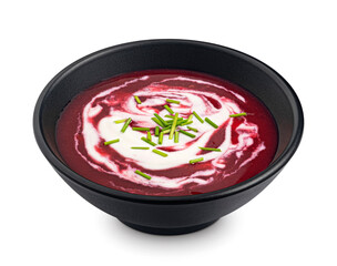 Beetroot soup in black bowl isolated on white background, full depth of field, package design element