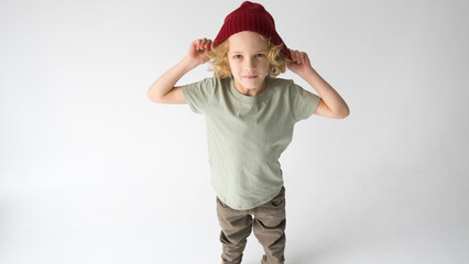 Young Boy Wearing Red Hat