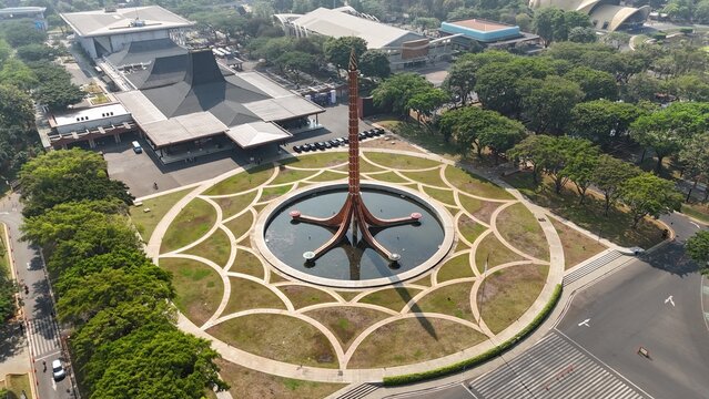 Jakarta, Indonesia - October 28, 2023: Taman Mini Indonesia Indah (TMII). The Pancasila Fire Monument (Tugu Api Pancasila) is a TMII landmark.