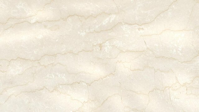 Marble surface visible through the waves of clear water	