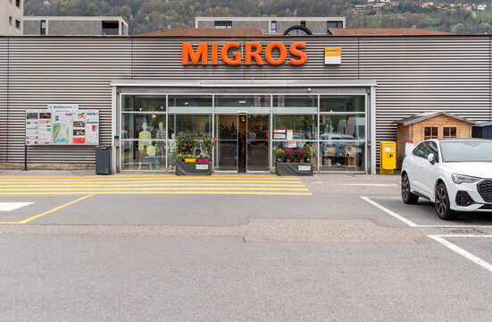 Agno, Ticino, Switzerland - April 9, 2024: View of the Migros supermarket in Agno, it is the largest supermarket chain in Switzerland
