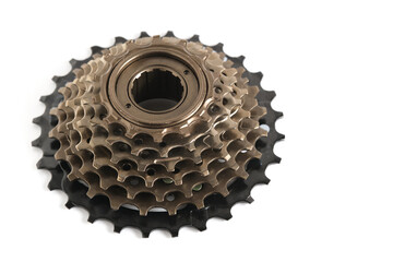Bicycle chain speed star for changing gears in closeup. Bicycle gear isolated on white background. Closeup image. - obrazy, fototapety, plakaty