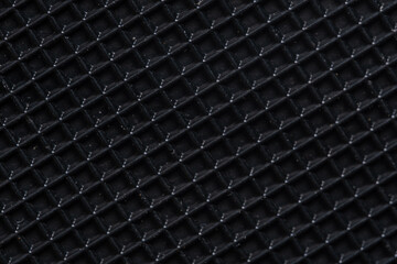 Black carbon fiber background. Closeup of carbon fiber texture.