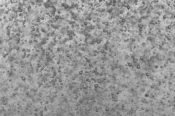 Obraz premium Macro shot of air bubbles in black and white. Abstract background.