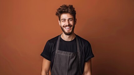 Closeup of a smiling man in a kitchen apron against a warm brown backdrop, radiating culinary enthusiasm and home chef expertise. Perfect for cooking enthusiasts and culinary brands. - obrazy, fototapety, plakaty