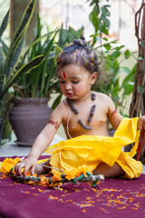 Portrait of cute Indian boy dresses as lord rama with bow at outdoor with blurred background at day