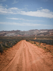 Fototapeta na wymiar dirt road leading into Glen Canyon national Recreation Area in Page Arizona