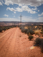 Powerline road through red desert landscape in Page Arizona