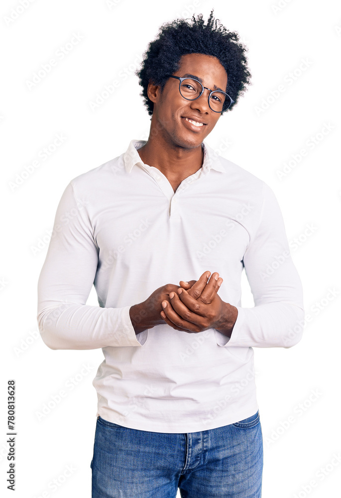 Poster Handsome african american man with afro hair wearing casual clothes and glasses with hands together and crossed fingers smiling relaxed and cheerful. success and optimistic