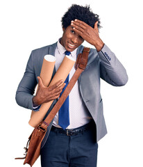 Handsome african american man with afro hair holding paper blueprints stressed and frustrated with...