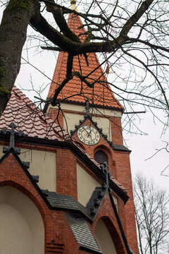 clock on the tower of the Catholic Church