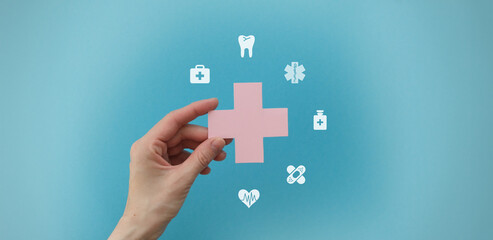 Health insurance and medical welfare concept. people hands holding plus symbol and healthcare...