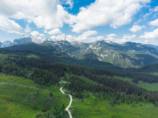 Aerial View of Mountain Valley and Green Hills of Velika Planina Big Pasture Plateau, Alpine Meadow...