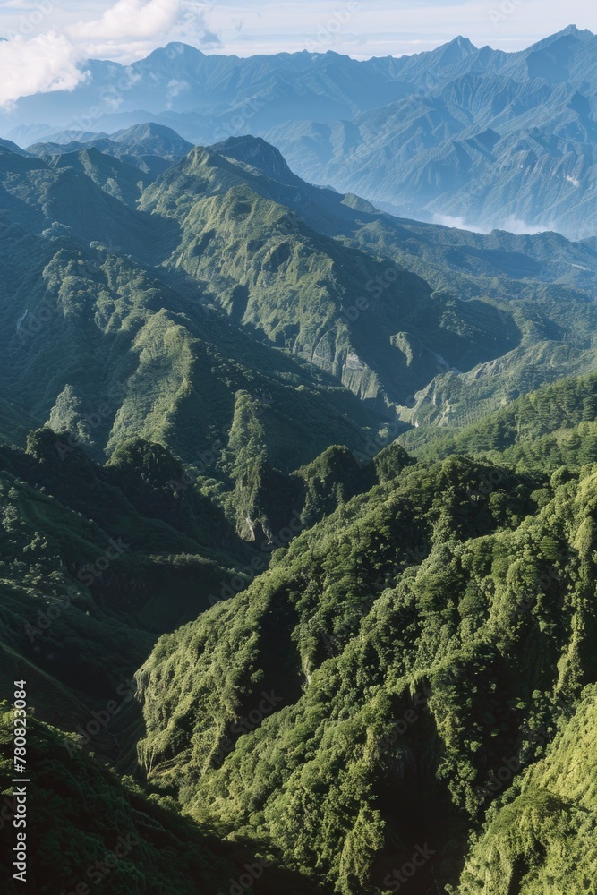 Poster A scenic view of a mountain range from a plane. Suitable for travel and landscape concepts
