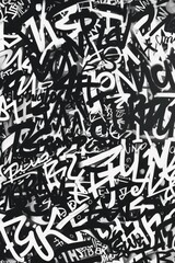 Black and white photo of graffiti, suitable for urban themes