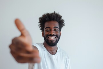A smiling black man with a beard and a white shirt. Generative AI.