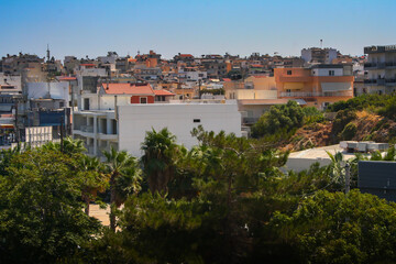 Fototapeta na wymiar Greece, panorama of the city with rich vegetation