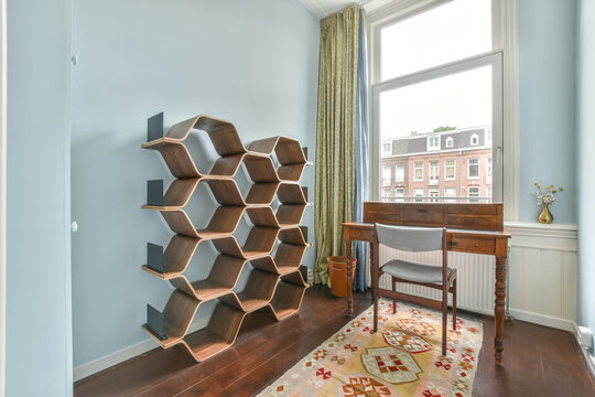 Elegant home office with unique bookshelf design